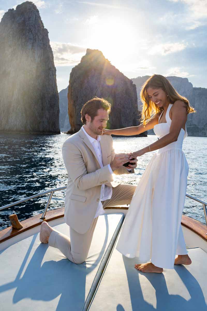 The moment in which he put on the engagement ring on the finger