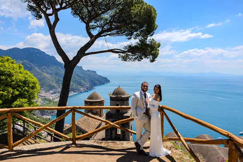 Sweeping coast views over the seascape in Ravello's Rufolo villa celebrating marriage for a nice romantic couple in love