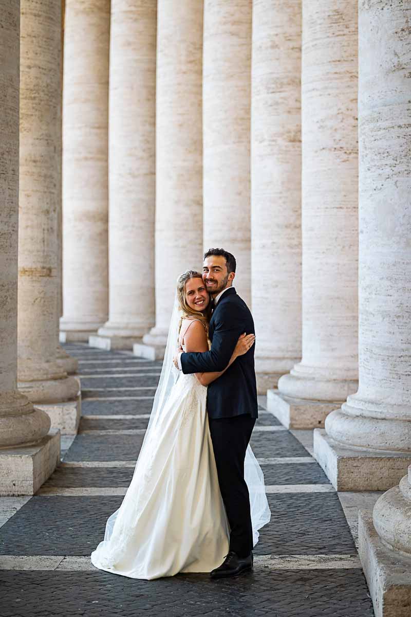In love couple photography after their novelli sposi experience in saint peter's square enjoying time together during a photoshoot