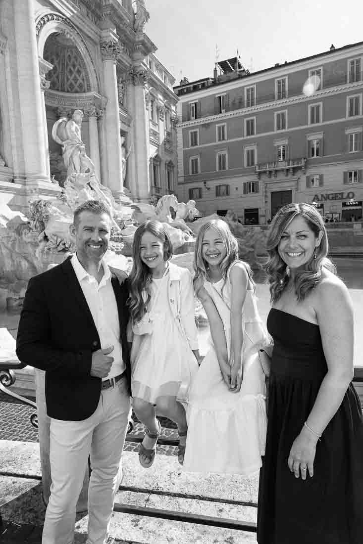 Black and white image. Group photography. Touring the roman city by van. Taking unique and creative pictures together