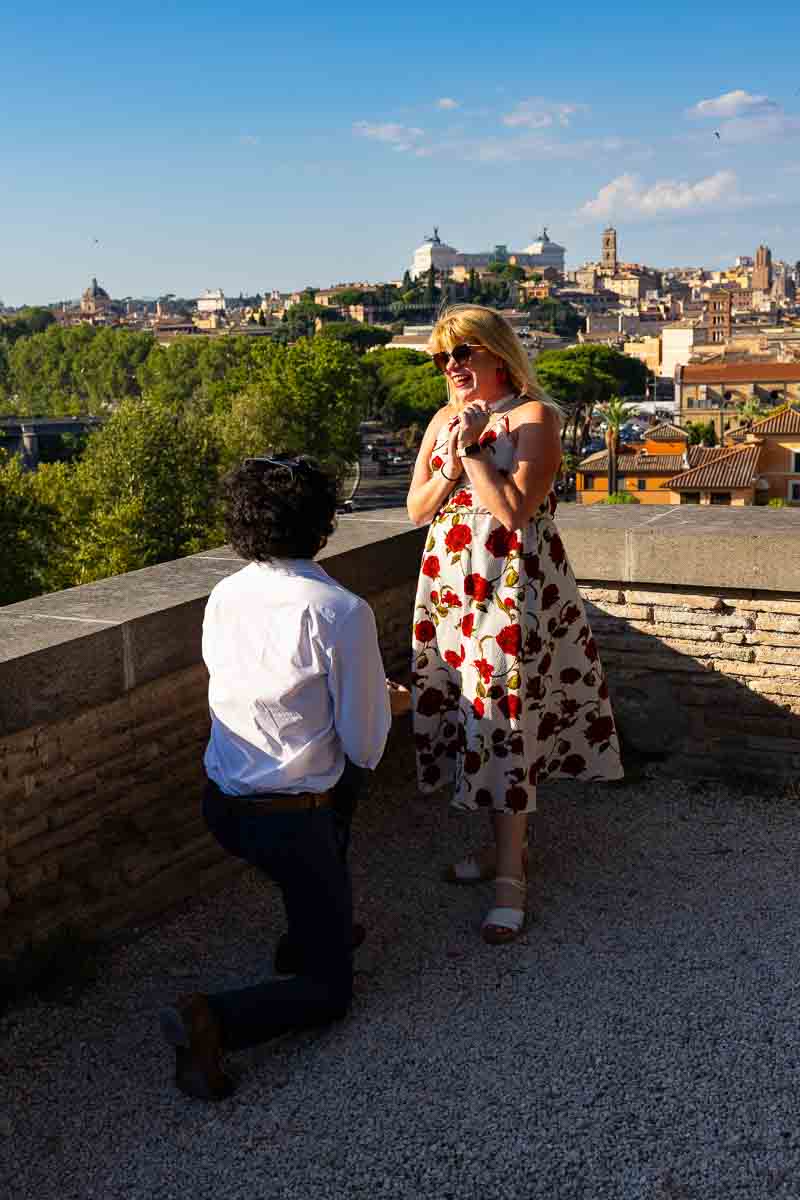 Picture of a scenic proposal moment while asking to marry him at Giardino Aranci in central Rome Italy