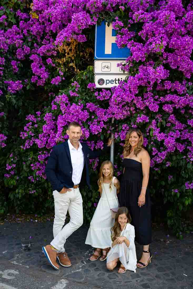 Picture taking underneath a very large bougainvillea flower plant acting as the perfect photographic backdrop to this photoshoot roman tour