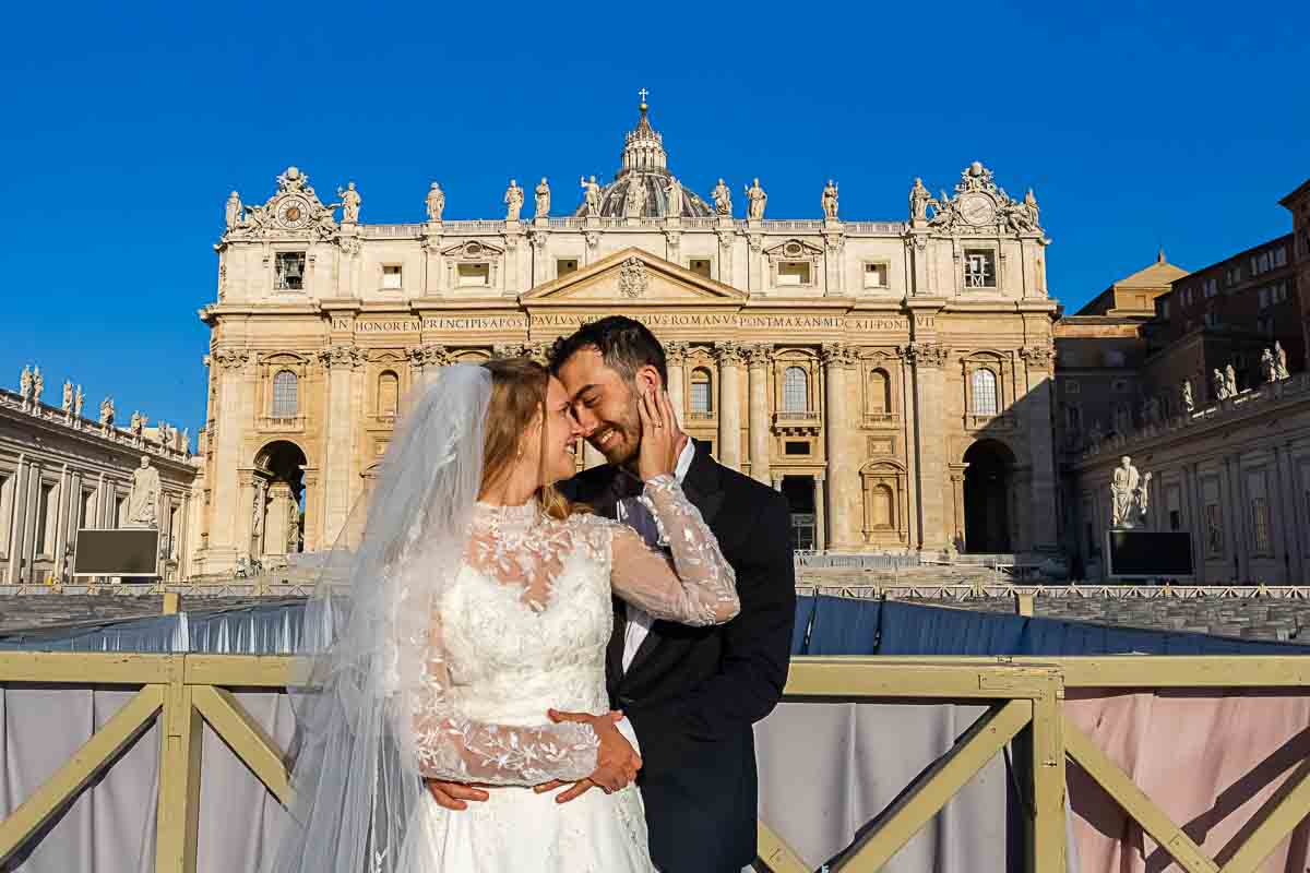 Posed portrait picture in front of the basilica smiling