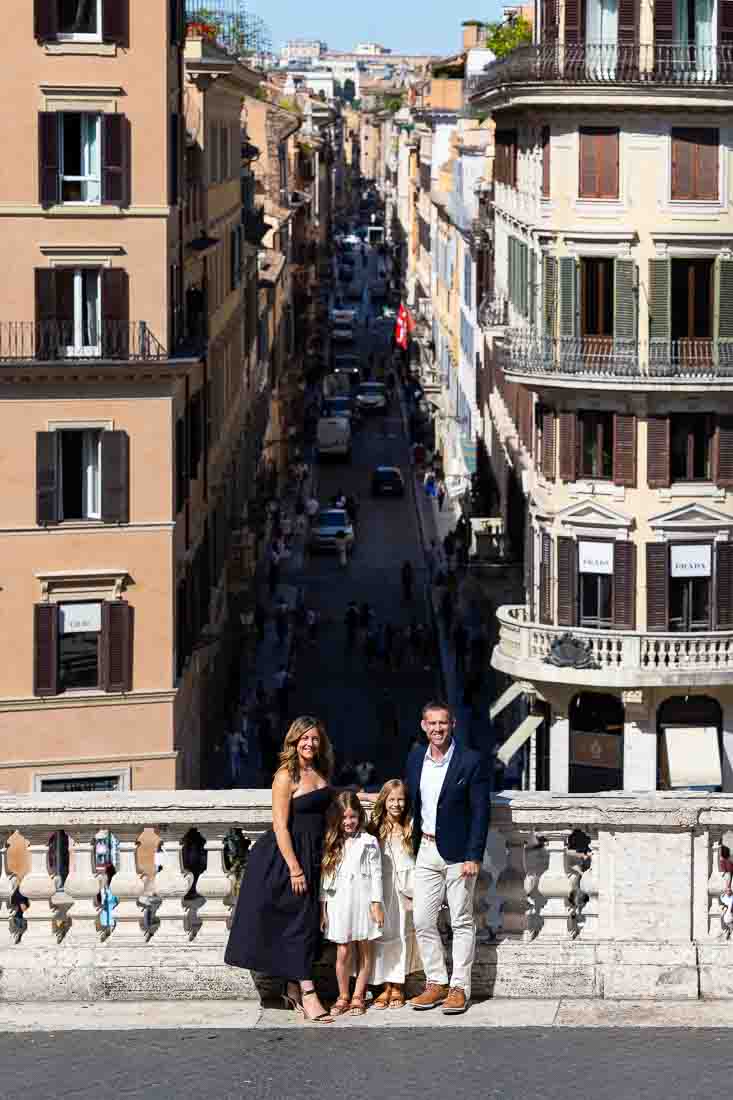 Via condotti fashion district photography session leaning into the marble balconade
