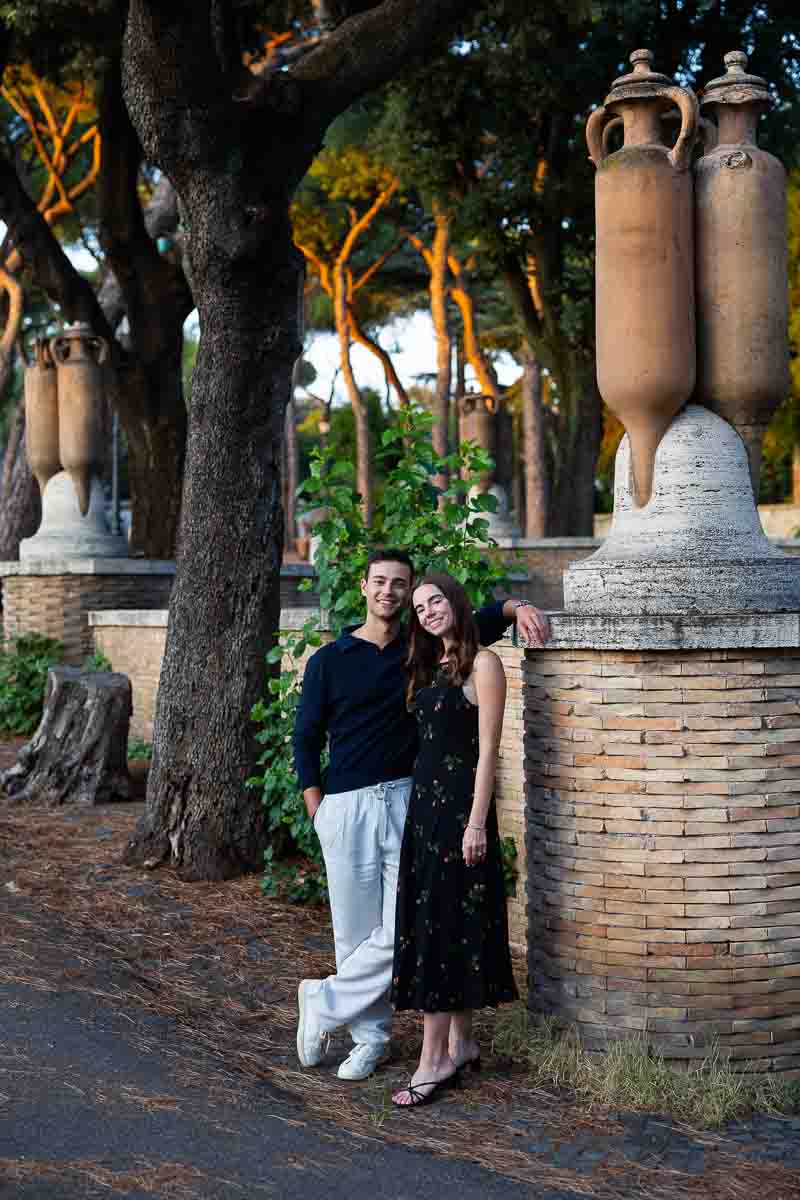 Standing close by ancient roman vases in Colle Oppio park